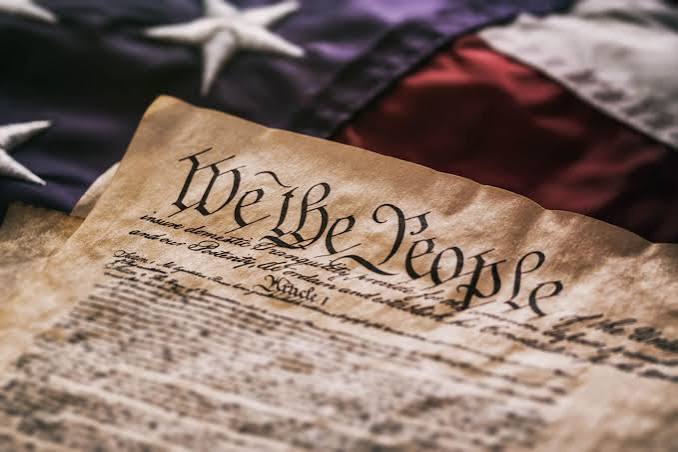 American flag and Constitution
