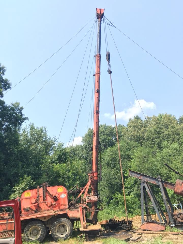 Oilfield workover rig at a job site